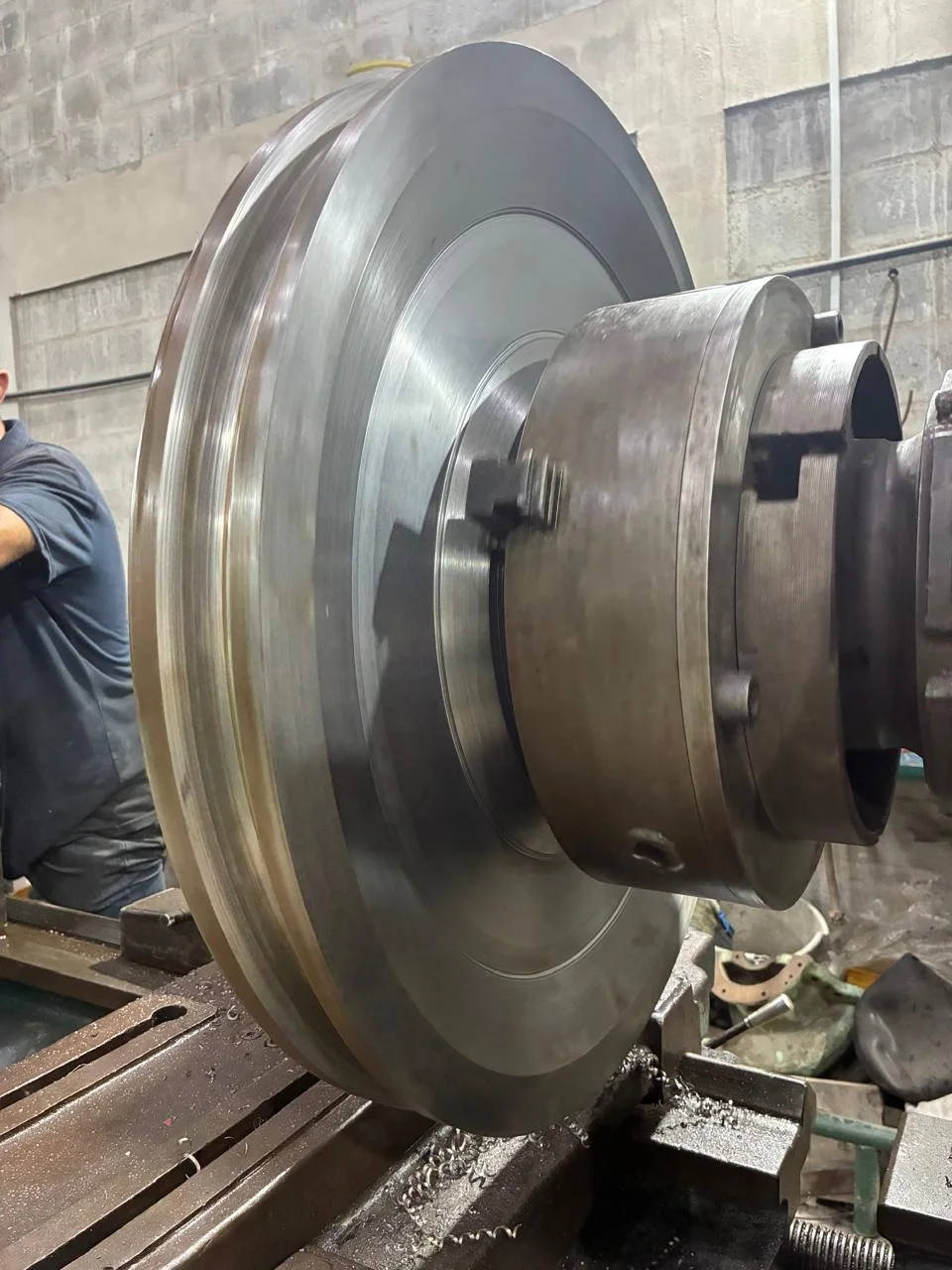 Large-diameter disc being machined on a lathe