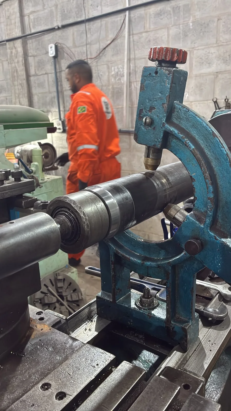 Shaft supported on a steady rest during machining