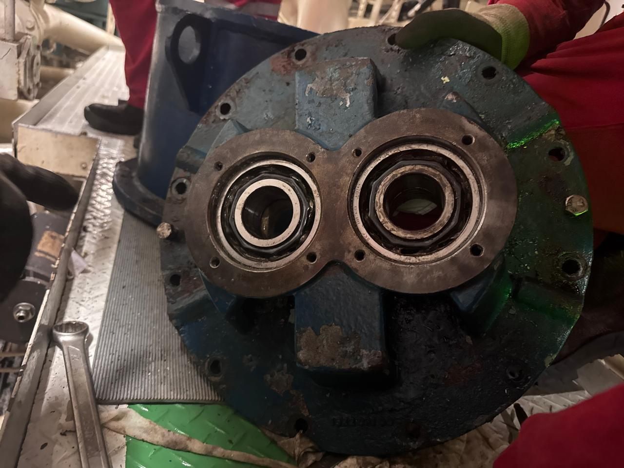 Bearing cover removed, exposing the bearings and their housings for inspection