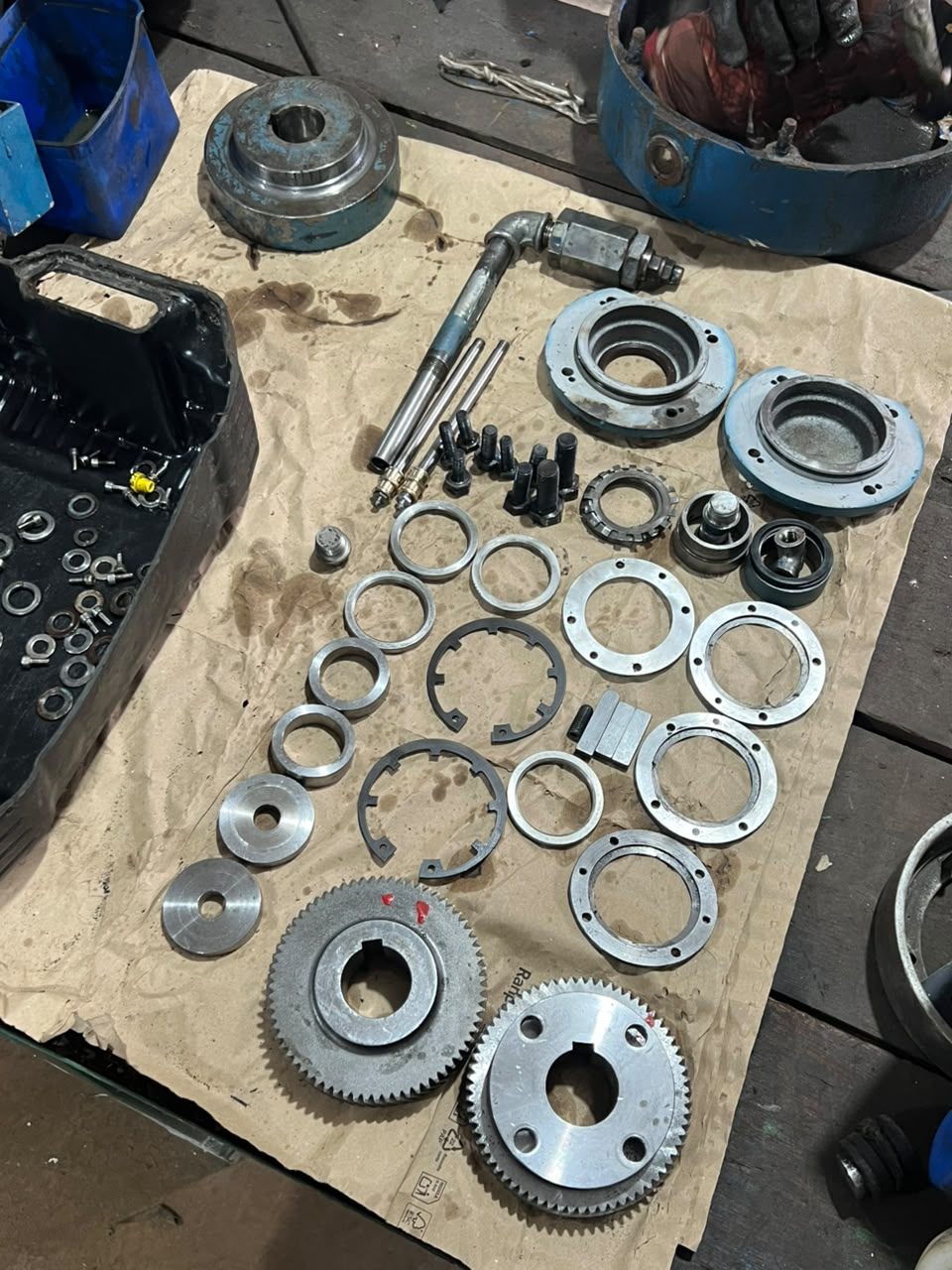Components stripped down and laid out on the bench for inspection