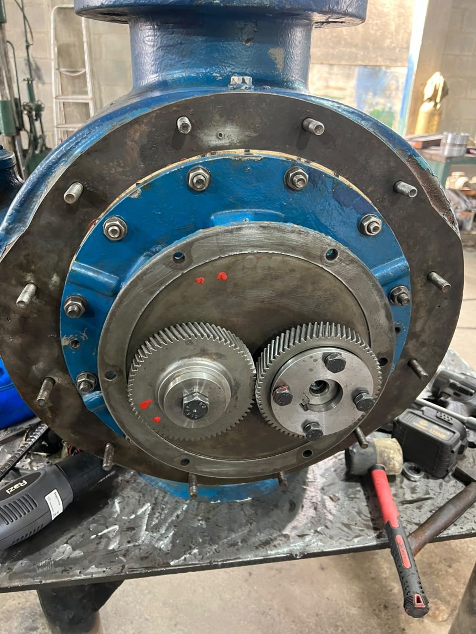 Gears fitted and meshed in the pump body, with reference marks applied