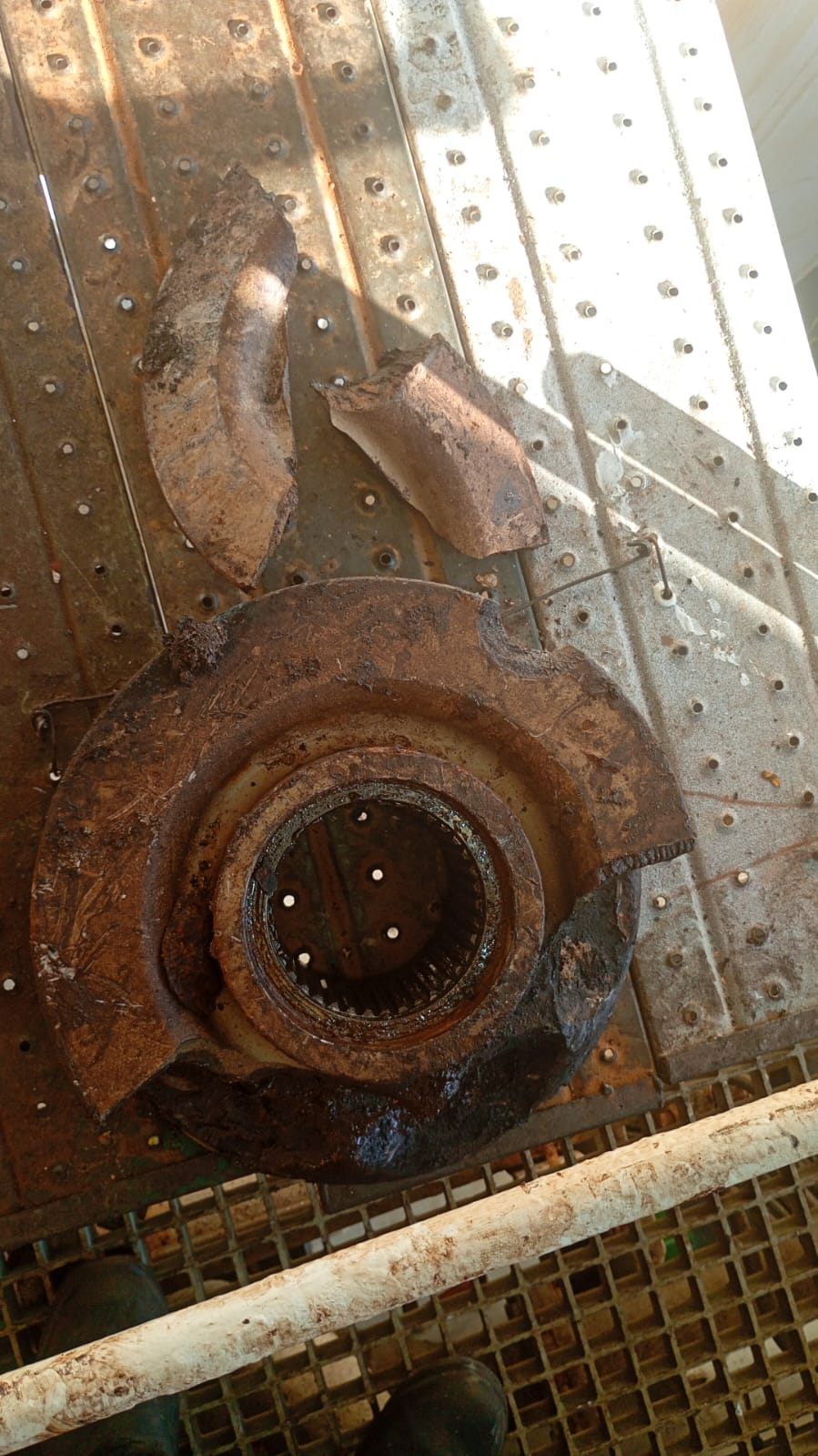 The part removed, with the rim broken and fragments detached from the body